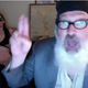 Illustration for article titled Randy Quaid returns by humping his wife while she wears Rupert Murdoch mask